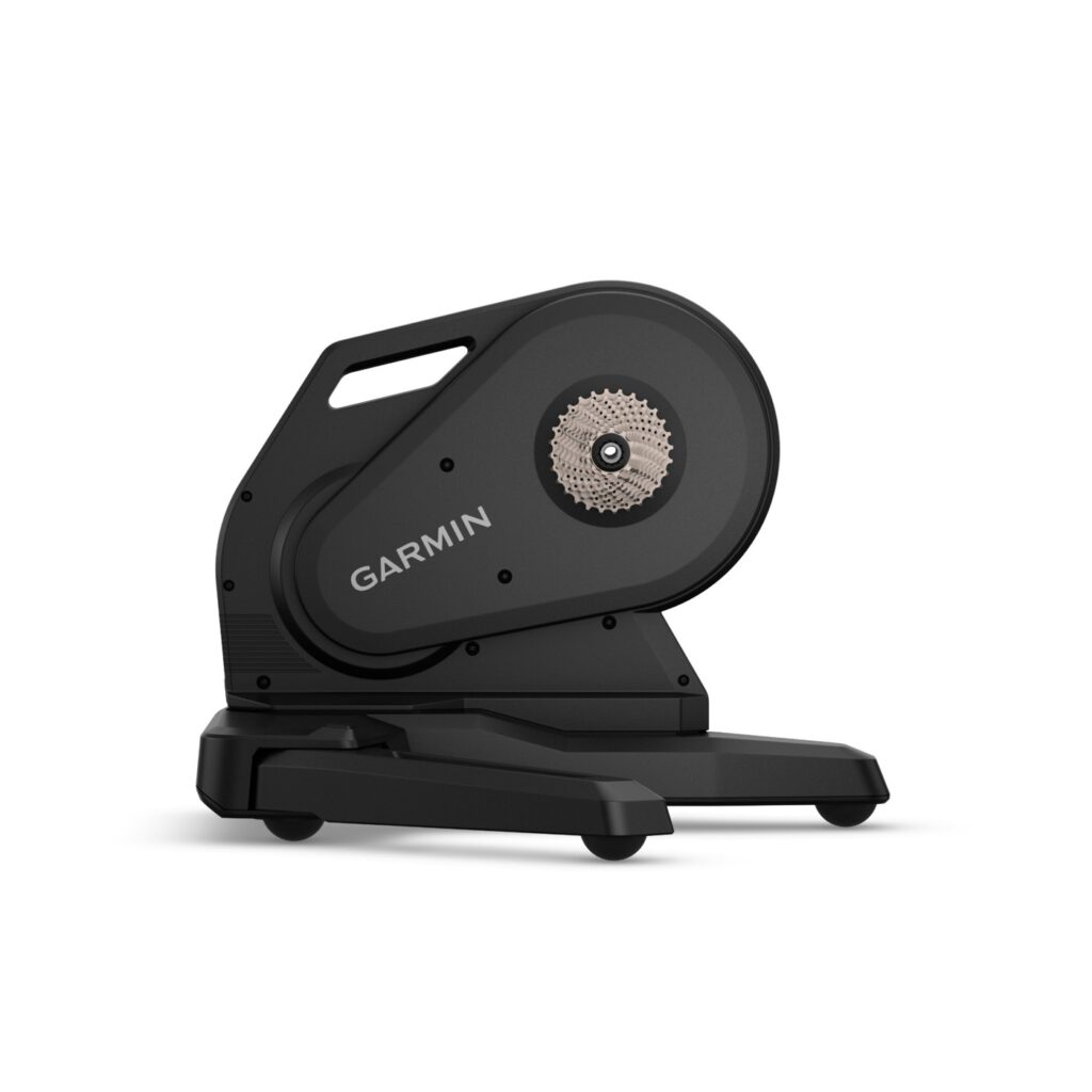 Zwarte Garmin Tacx Nēra smart trainer met voorgemonteerde cassette, van opzij